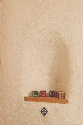 The wood blocks in Louis’s bedroom niche belonged to Bradley’s father when he was a boy